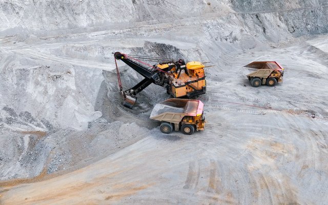Shovel loading a haul truck in an open-pit mine